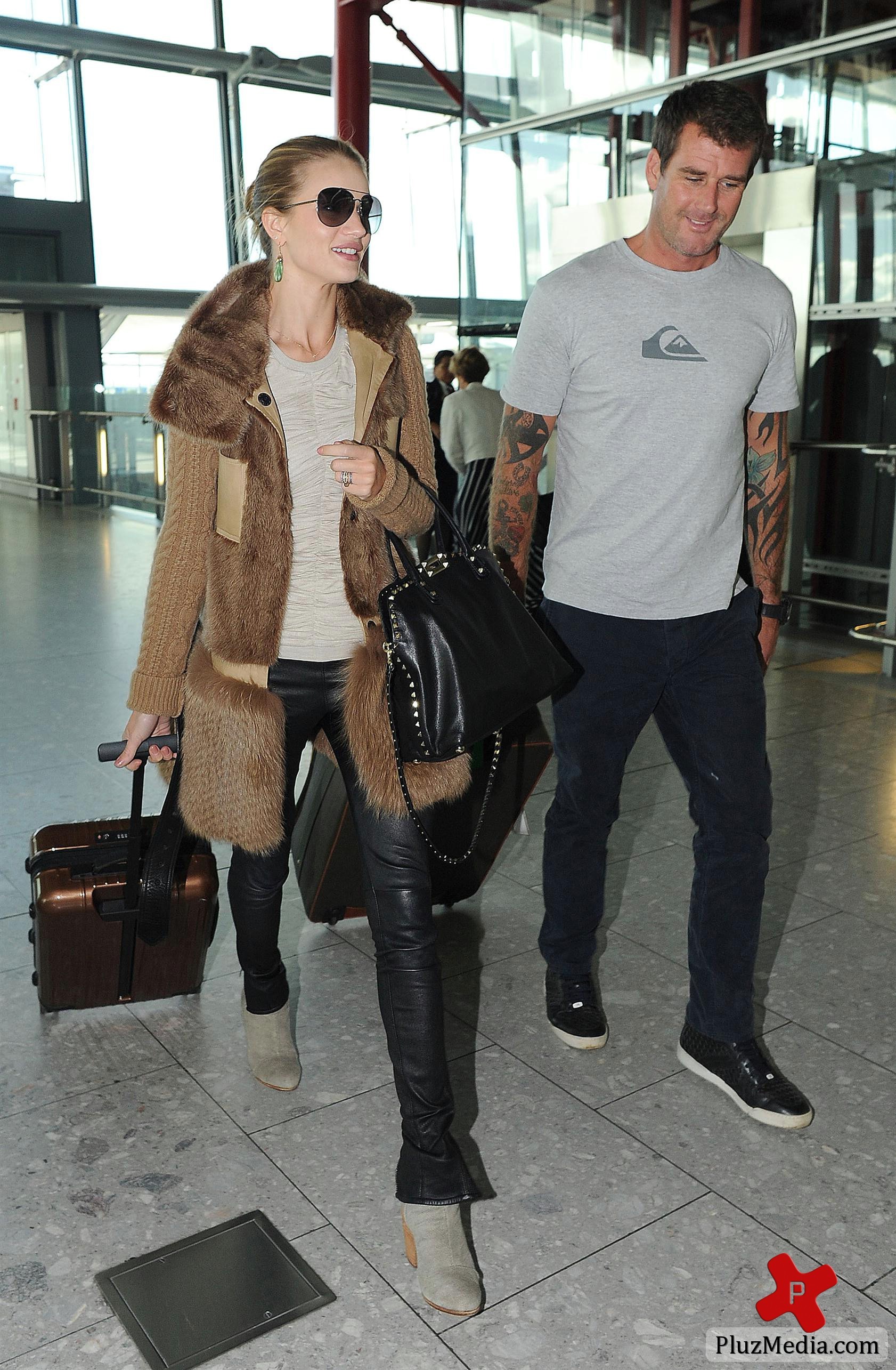 Rosie Huntington-Whiteley arriving at Heathrow Airport | Picture 83724